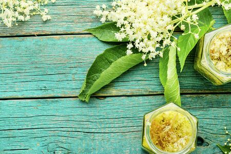 Healing tincture is medicine made from elderberry flowers.Herbal medicineの写真素材