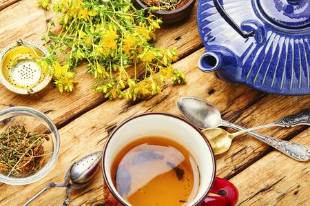 Cups of healthy herbal tea with hypericum.Medicinal herbの写真素材
