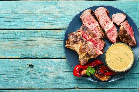 Piece of roast beef with spices.Delicious beef steak and meat sauce.の写真素材