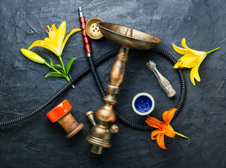 Oriental smoking hookah with fragrant flower tobacco.の写真素材