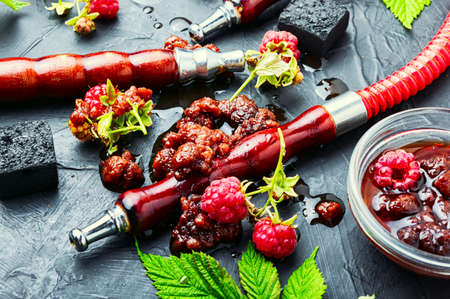 Oriental hookah with tobacco with the aroma of raspberry jam.Eastern shisha