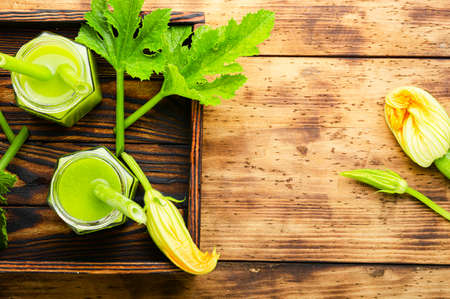 Green fresh raw smoothie from zucchini.Vegetable smoothieの写真素材