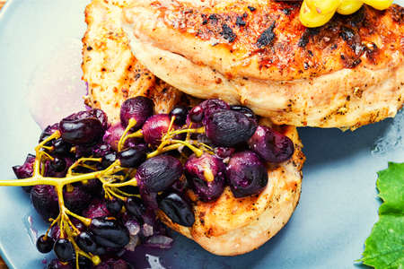 Grilled chicken breast marinated in grape sauce.Fried chicken fillet.Healthy foodの写真素材