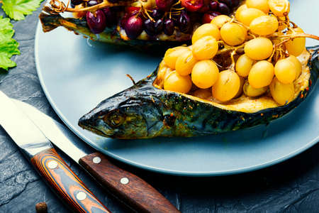 Baked mackerel or scomber in grape berry sauce.Roasted fishの写真素材
