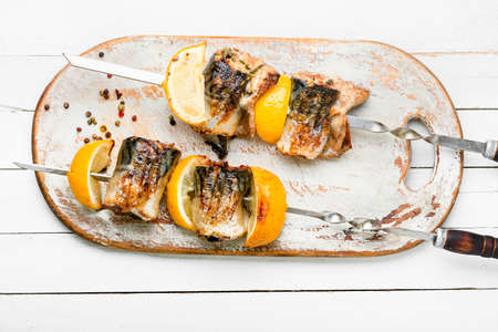 Grilled skewers of mackerel with lemon.Grilled fish kebabの写真素材