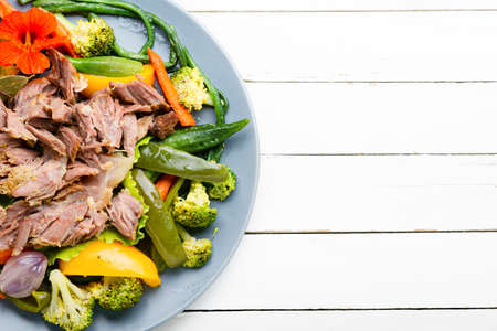Appetizing beef stew with seasonal vegetables.Flat lay with copy space