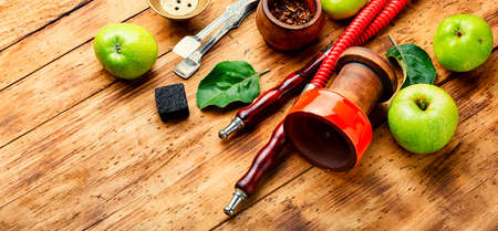 Oriental tobacco hookah.Turkish hookah with tobacco with green apple flavor.