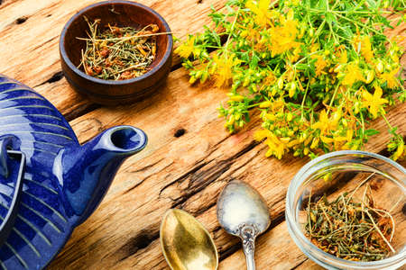 Fragrant useful herbal tea with hypericum.Herbal medicine.Tea with herbs.の写真素材