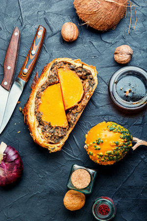 Wellington pumpkin, loaf of bread stuffed with baked mushrooms and pumpkin.の写真素材