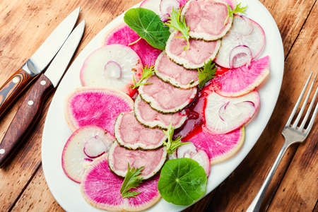 Fresh dietary salad with veal tongue and radishの写真素材