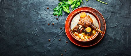 Bowl of appetizing healthy goose or duck soup.Chicken soup.Copy spaceの写真素材