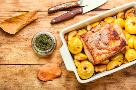 Pork loin stew with apple. Baked meat with applesの写真素材