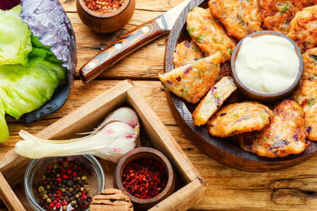 Homemade dietary cabbage cutlets.Tasty vegetable cutlets on the table.の写真素材