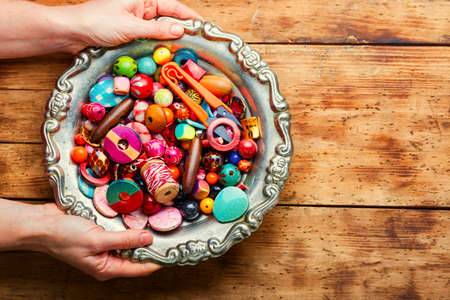 Colorful seed beads of different sizes.Making of handmade jewelleryの写真素材