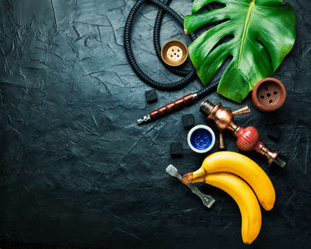 Oriental smoking shisha with hookah tobacco with ripe banana aroma.Copy spaceの写真素材