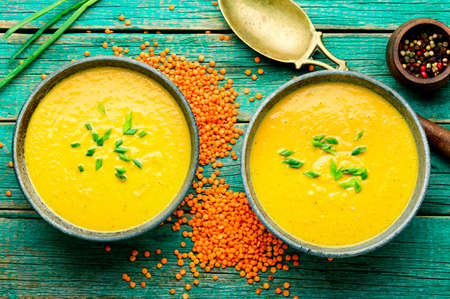 Plate of aromatic red lentil soup.Vegetable spicy soup