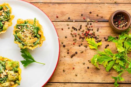 Appetizing cheese basket with avocado, cowpea and nuts. Banquet, holiday foodの写真素材