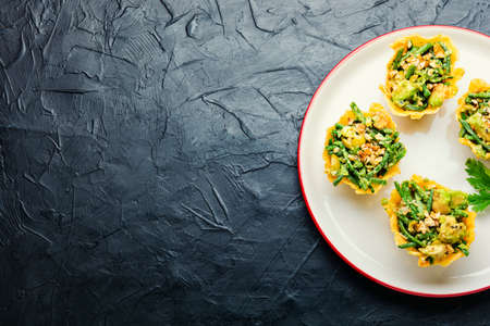 Appetizing cheese basket with avocado, cowpea and nuts. Banquet, holiday foodの写真素材