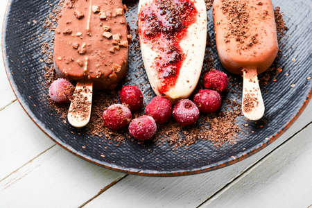 ice cream with chocolate and cherry.Ice cream sticksの写真素材