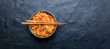 Funchoza, chinese noodles with spices and chicken.Copy spaceの写真素材