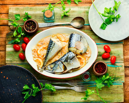 Steamed mackerel pieces on in baking dish.Diet food, healthy food.Baked scomberの写真素材