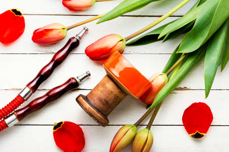 Delicious Turkish smoking shisha.Hookah smoking.Kalian with tobacco with tulip flavor.の写真素材
