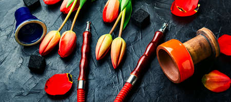 Delicious Turkish smoking shisha.Hookah smoking.Kalian with tobacco with tulip flavor.の写真素材