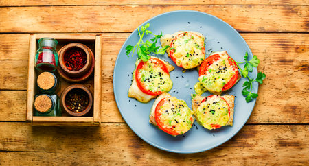 Baked fish with cheese and tomato.Roasted pangasiusの写真素材