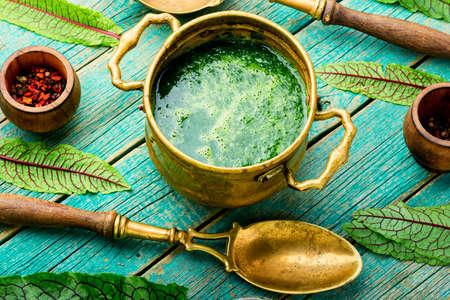 Homemade green sorrel soup. Vegetarian soup in a bowl.の写真素材