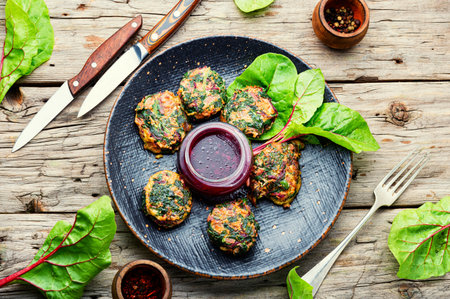 Delicious homemade chard cutlets.Vegetarian cutlets with fruit sauce.Vegan food.の写真素材