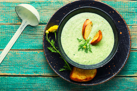 Puree soup, dietary zucchini and herb soup, garnished with croutons. Summer soupの写真素材