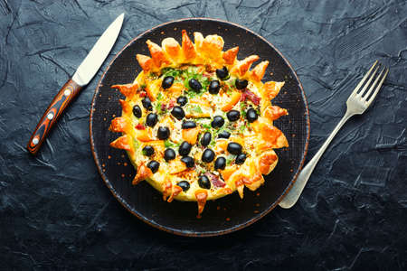 Open pie with olives, mushrooms and sausage. Salty piesの写真素材