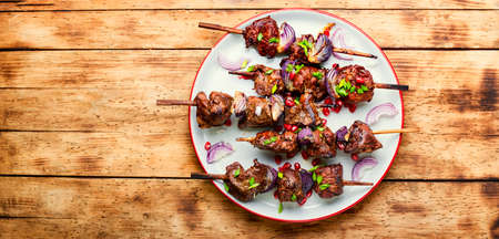 Turkish or arabic tradition liver kebab on skewers.Ciger kebab.Copy spaceの写真素材