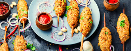 Lula kebab, minced meat skewered and grilled on charcoalの写真素材