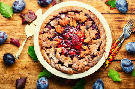 Homemade rustic pie with autumn plum.Fruit summer pastriesの写真素材