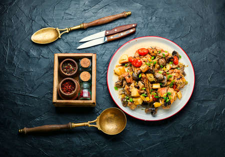 Appetizing stew or ragout with chicken meat and vegetablesの写真素材