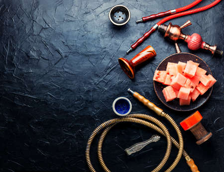 Tasty smoking hookah with watermelon flavored tobacco.Space for text