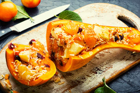 Baked pumpkin with apples, cherry plum and rice.Azerbaijan cuisineの写真素材