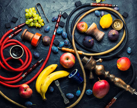 Fresh smoking shisha with fruit flavor.Oriental hookah on fruit tobacco