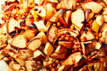 Autumn pie with apples, nuts and sea buckthorn. Charlotte on kefir.の写真素材