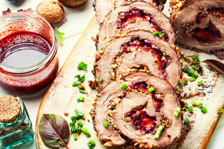Pork roulade or meatloaf with autumn plum and nuts