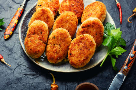 Homemade minced fish cutlets and fish steak