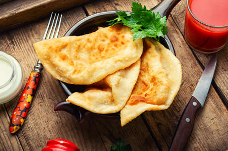 Cheburek, a dish of unleavened dough stuffed with minced meat. Crimean Tatar cuisineの写真素材