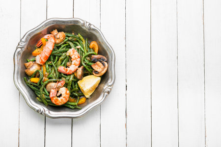 Asian delicious salad with shrimp, asparagus beans and okra. Copy spaceの写真素材