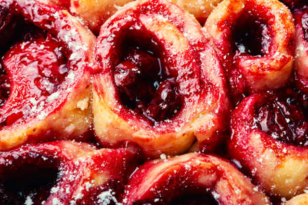 Baked cake or cottage cheese pie with cherry filling. Close upの写真素材