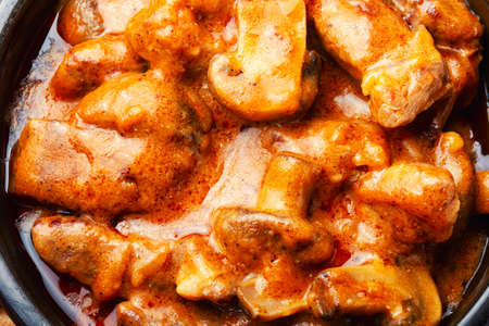 Fried meat with mushrooms, beef stroganoff from pork.の写真素材