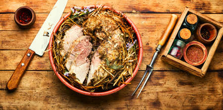 Piece of pork meat grilled with herbs and spices.の写真素材