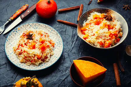 Rice with juicy pumpkin. Vegetarian pilaf with pumpkinの写真素材