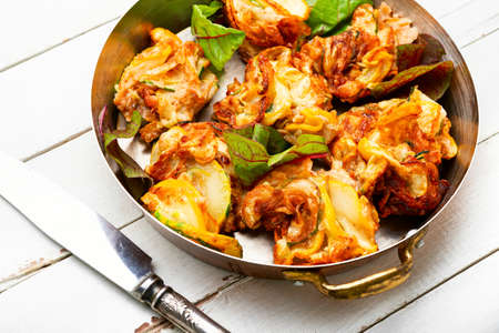 Tasty fried zucchini and fresh herbs. Roasted eggplant