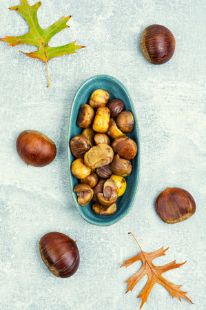 Roasted peeled chestnuts. Delicious treat: roasted chestnuts.